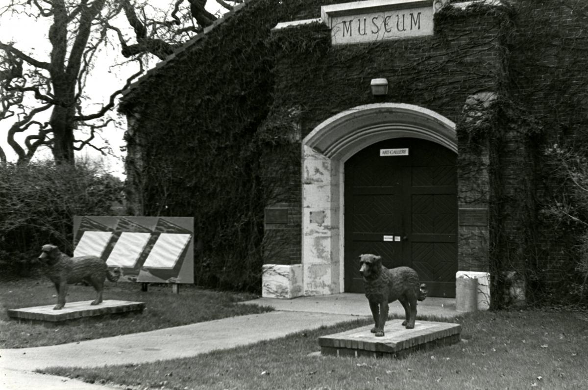 Undated photo of museum exterior, covered in vines 